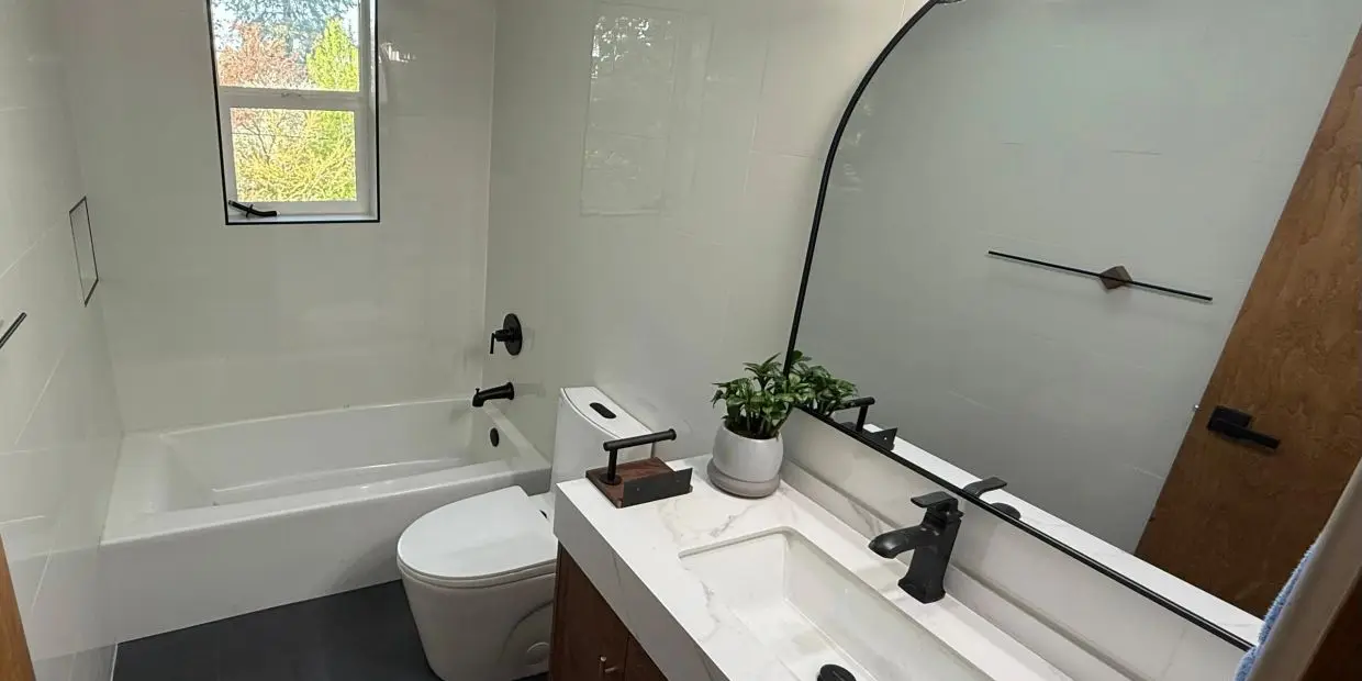 Renovated bathroom with vanity