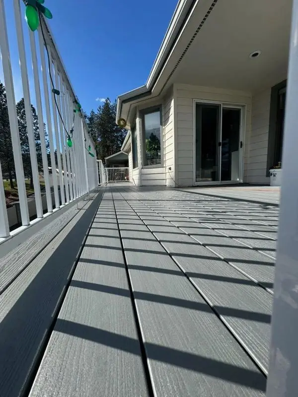 Composite deck with vinyl railing built by Firefly in the Spokane region